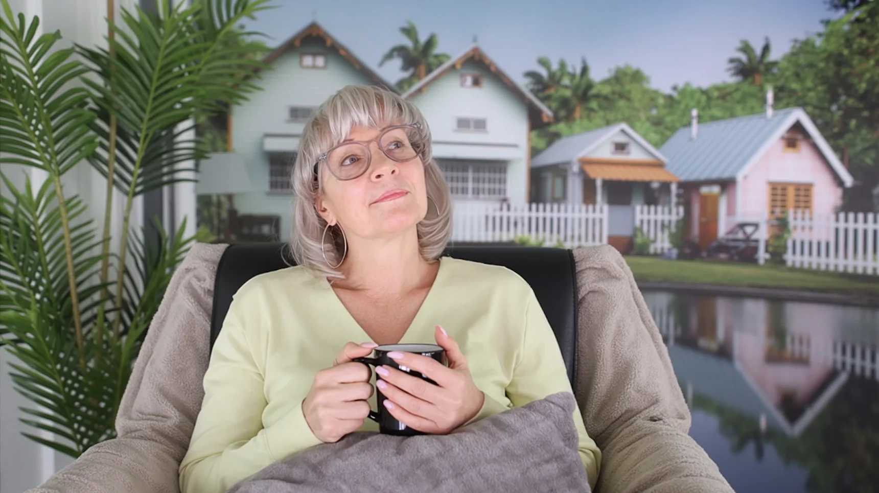 Susan relaxing in a recliner imagining her peaceful happy place while building a new alcohol-free evening routine at home.