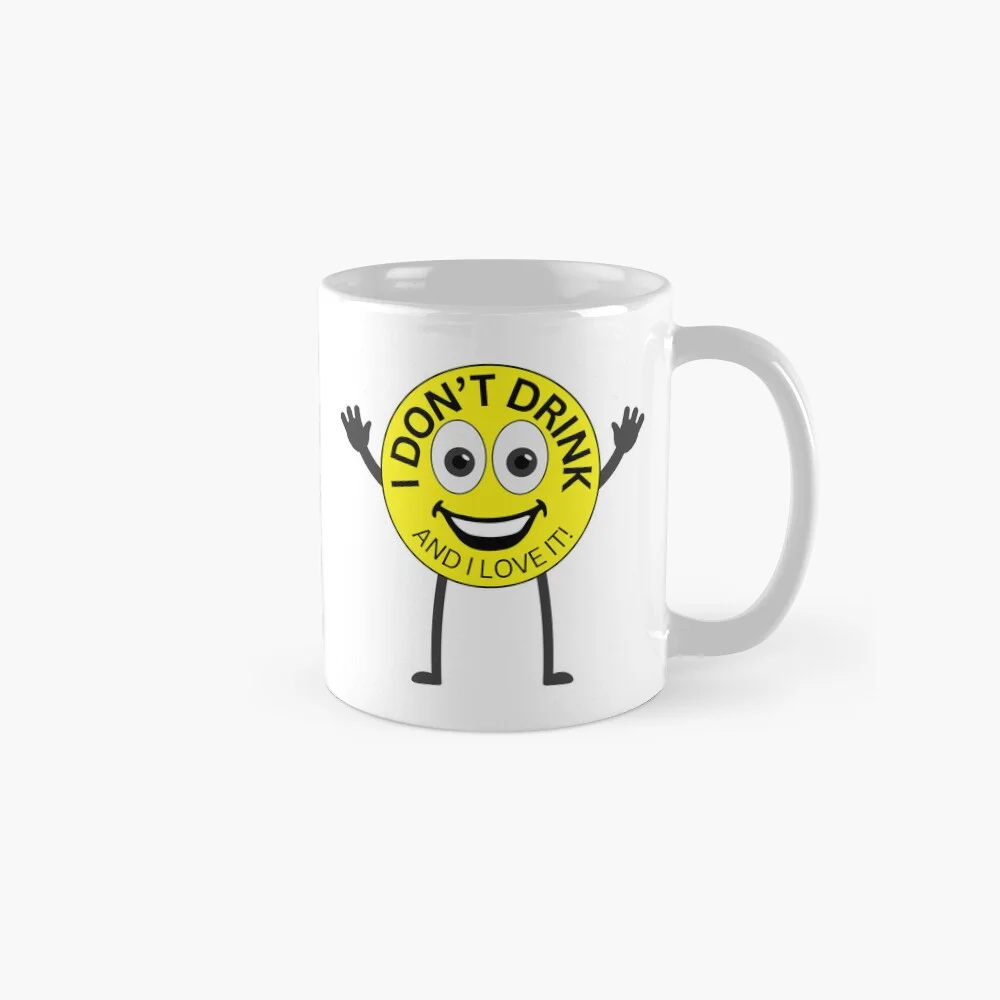 Funny “I Don’t Drink and I Love It” sober smiley face coffee mug with arms and legs design.